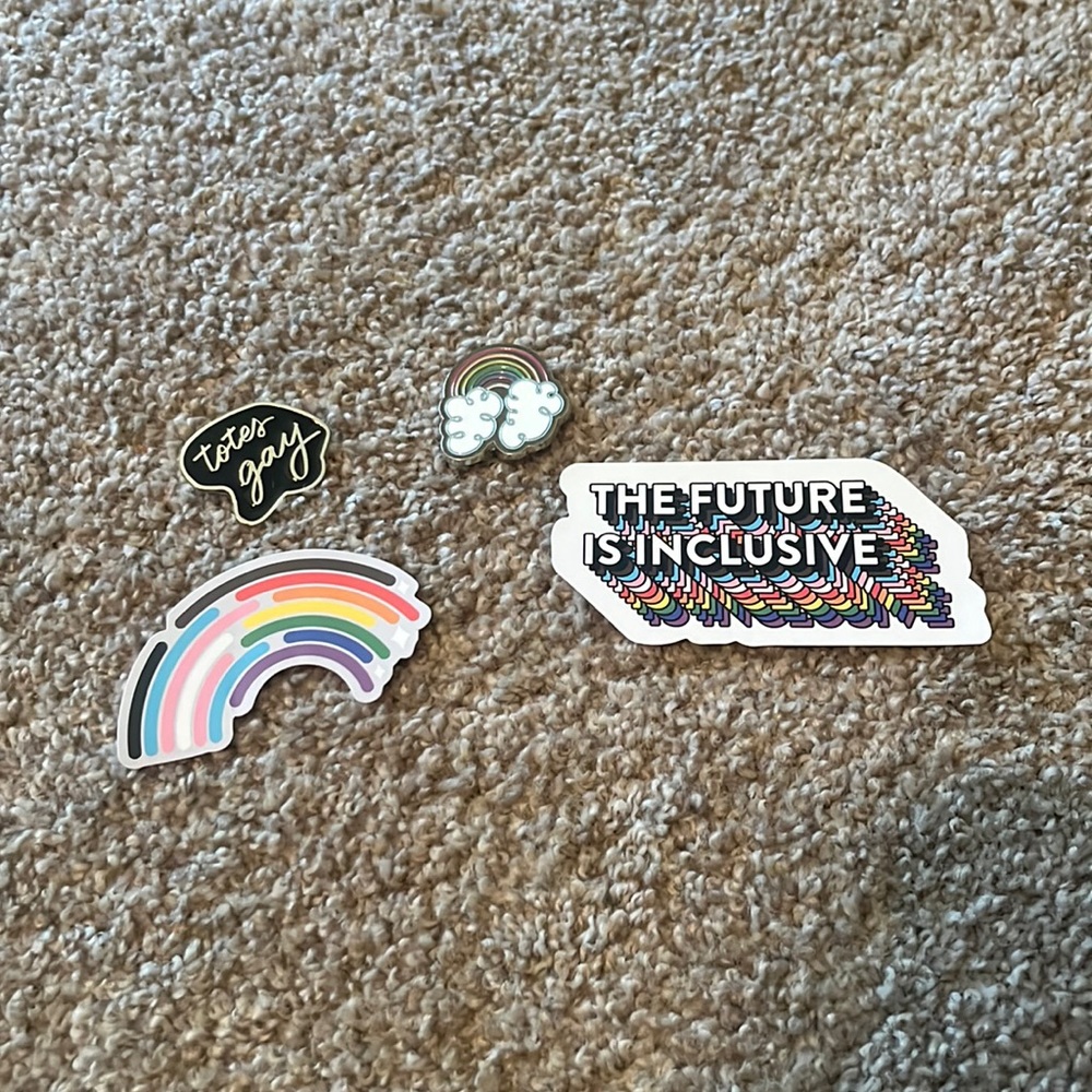 2 Pride pins and stickers